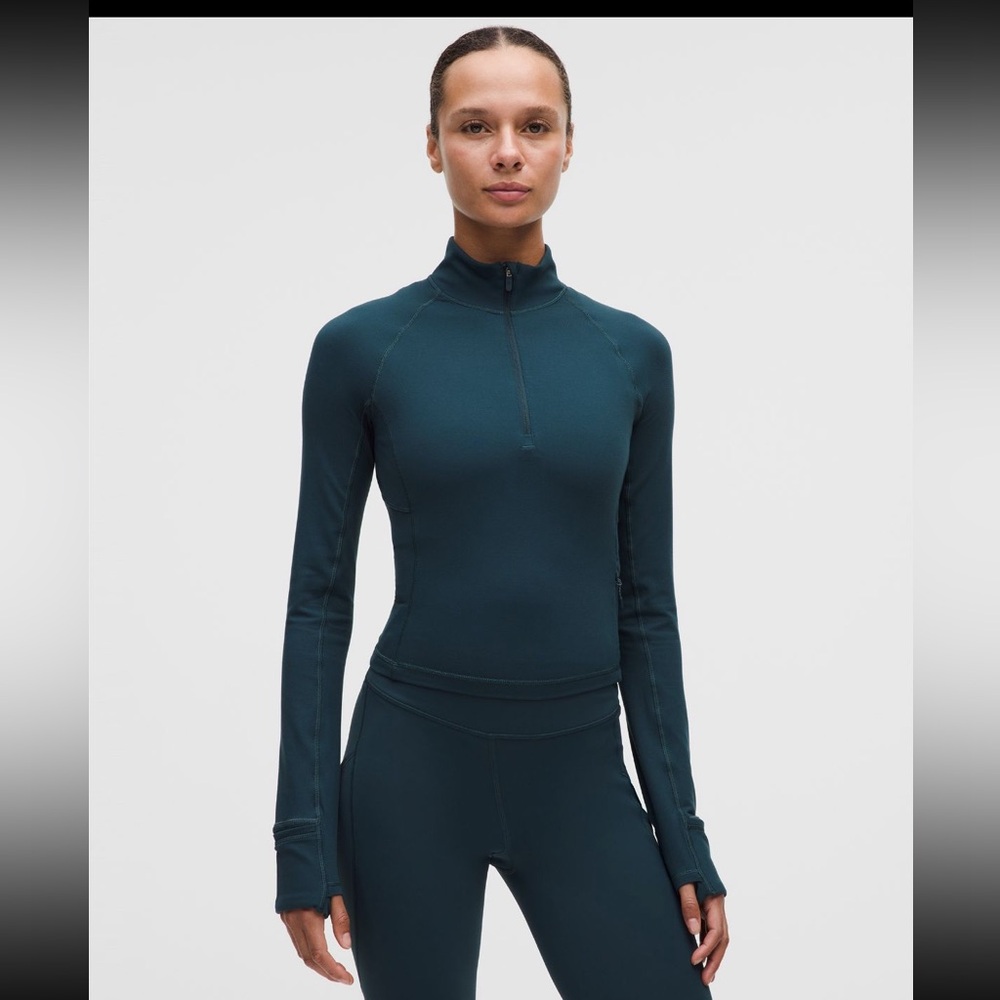 “Its Rulu Cropped Half Zip” in Indochine Blue size M